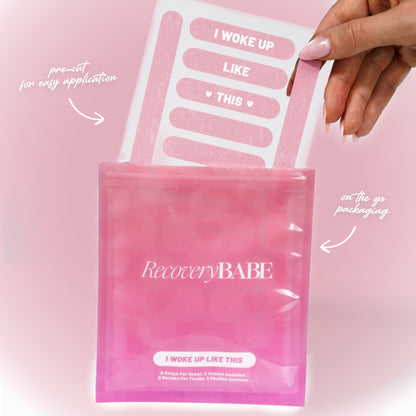 Hand holding a package of 'Recovery Babe' pink adhesive nose tapes with text indicating pre-cut application and on-the-go packaging.