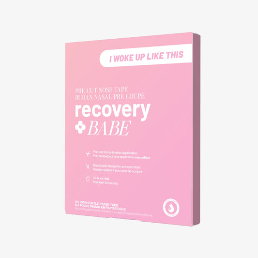 Pink packaging of 'recovery babe' pre-cut nose tape with 'I woke up like this' label on a white background